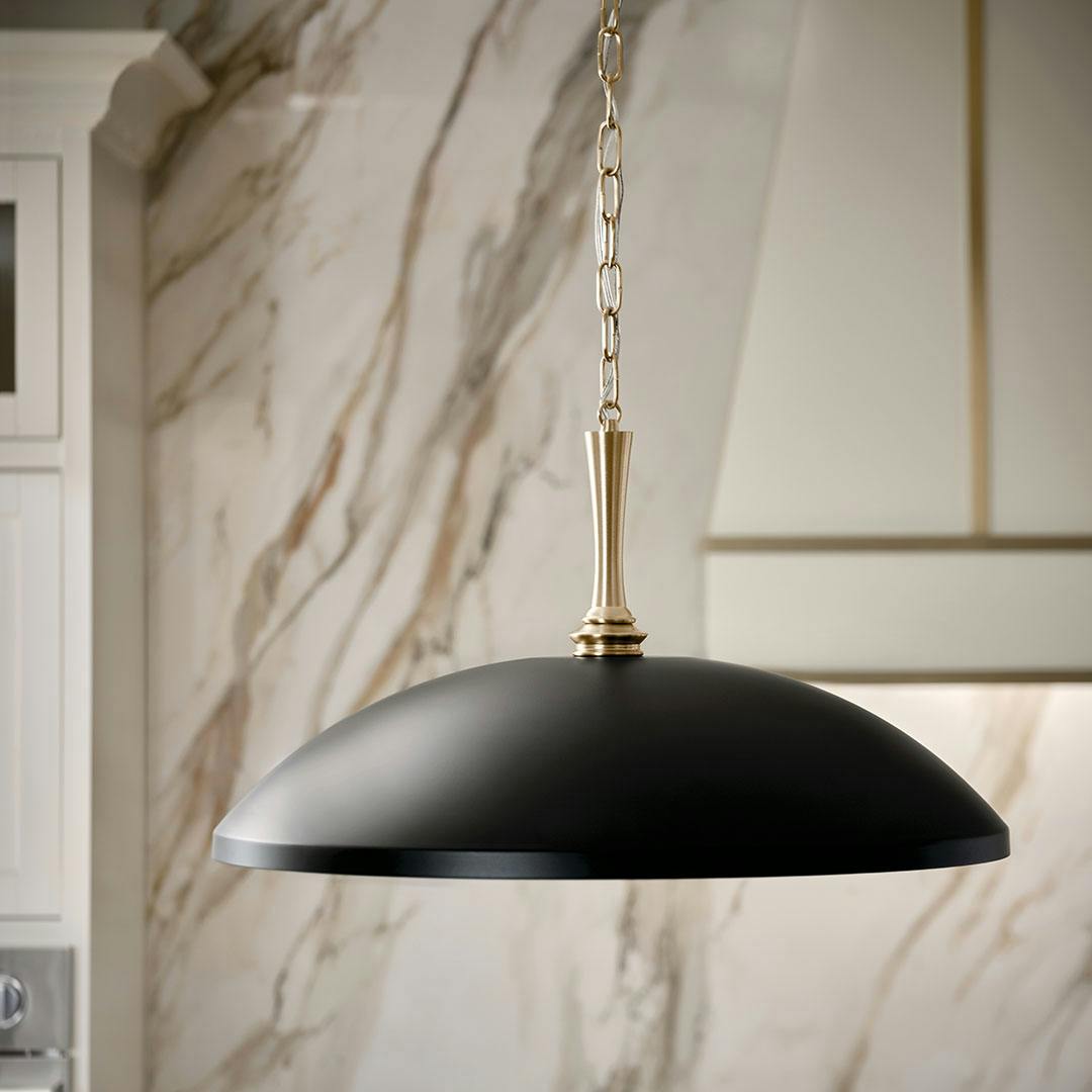 Kitchen in day light with the Delarosa 24 Inch 1 Light Pendant in Black and Champagne Bronze