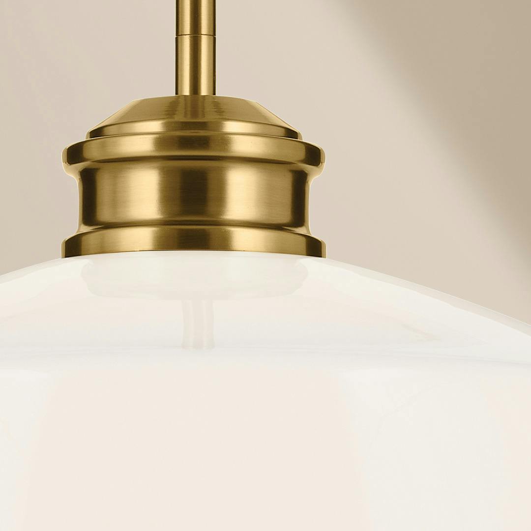 Close up view of the Renneker 1 Light Pendant in Brushed Natural Brass