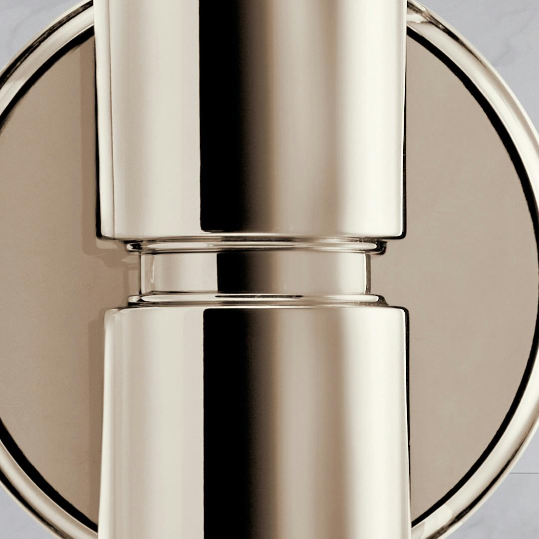 Close up view of the Aviv 24 Inch 2 Light Wall Sconce with Clear Glass in Polished Nickel