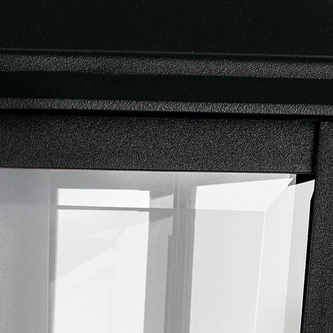 Close up of the Mathus 13" 1 Light Outdoor Wall Light with Clear Glass in Textured Black on a white background