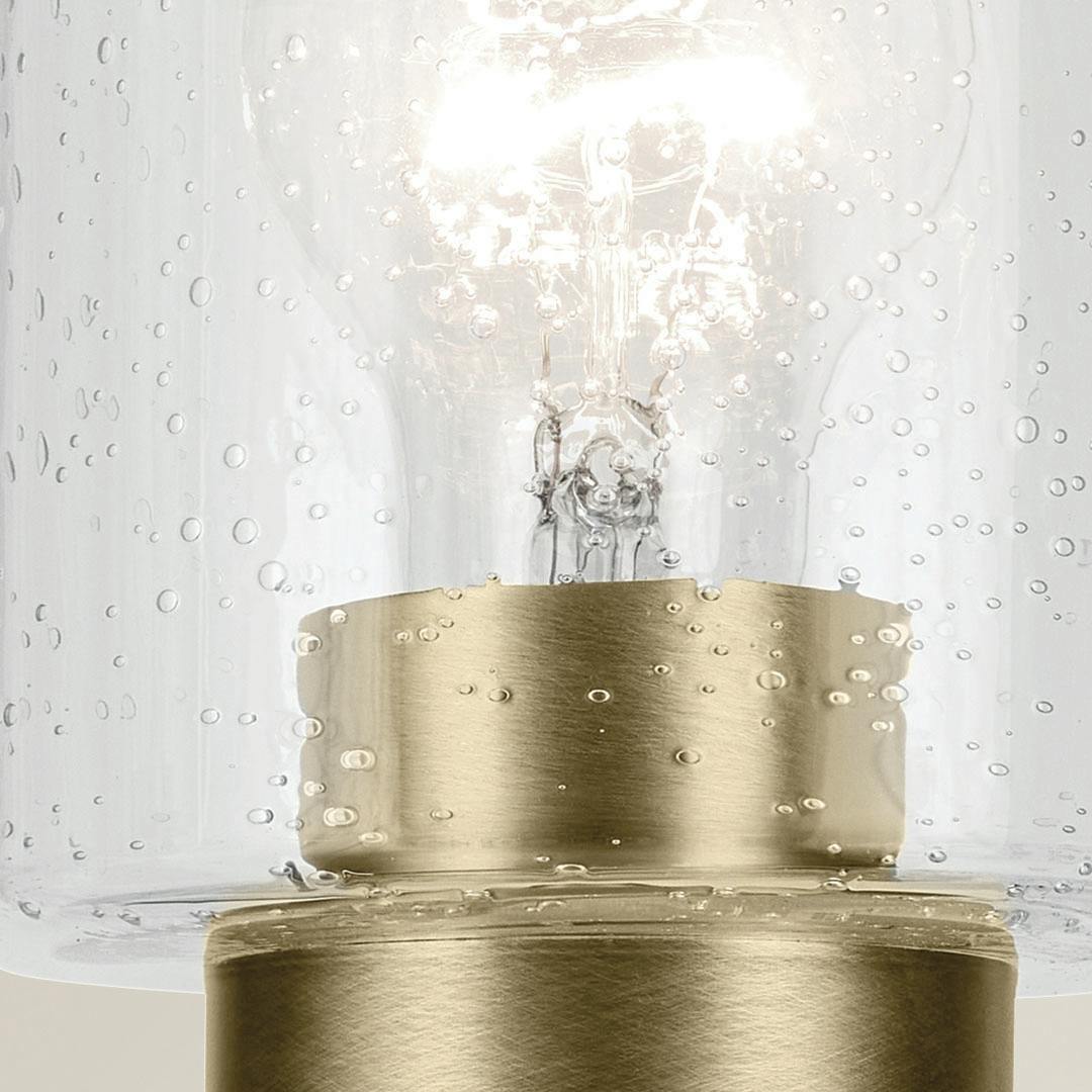 Close up view of the Winslow 13" 2-Light Vanity Light in Natural Brass