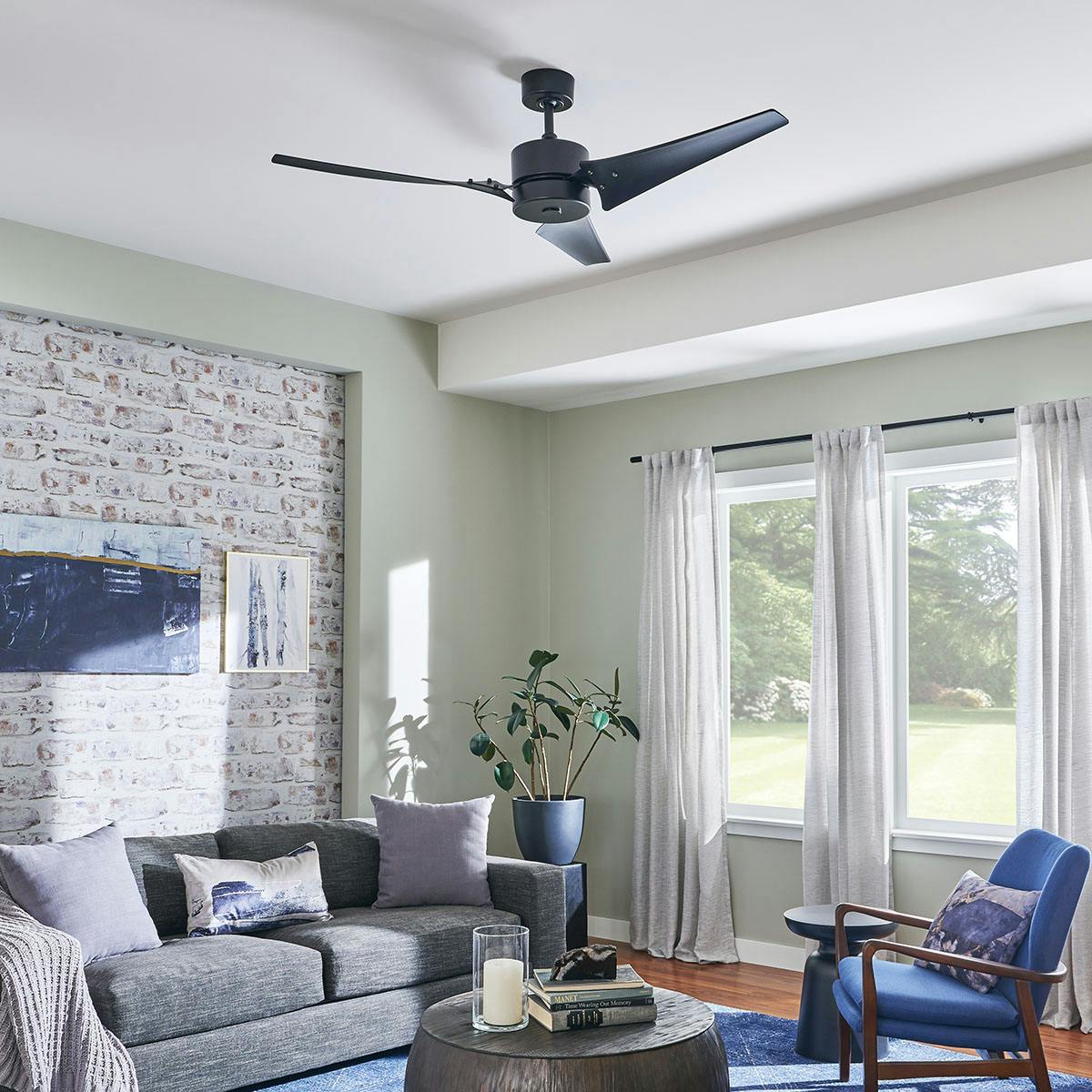 Living room featuring Motu ceiling fan 33001SBK