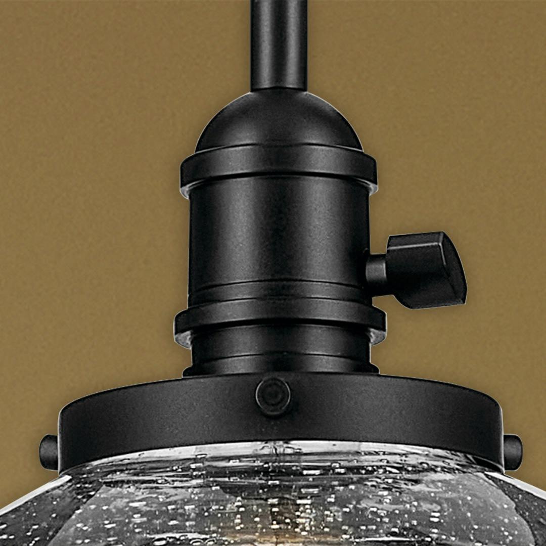 Close up of the Avery 11" 1-Light Dome Pendant with Clear Seeded Glass in Black