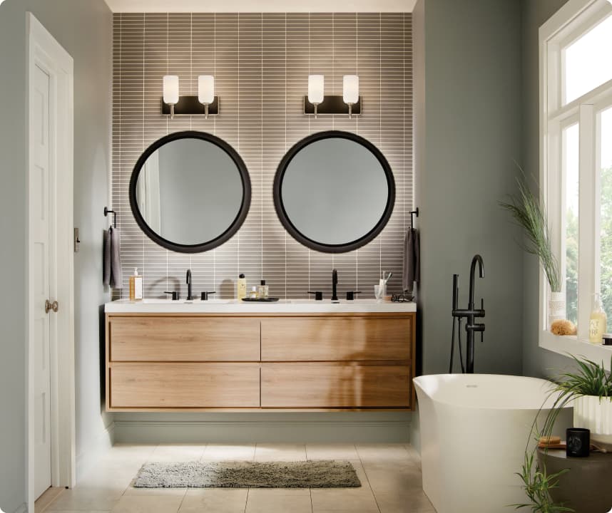 Bathroom with Solia vanity lights above two sinks with two Chennai mirrors turned on during the day 