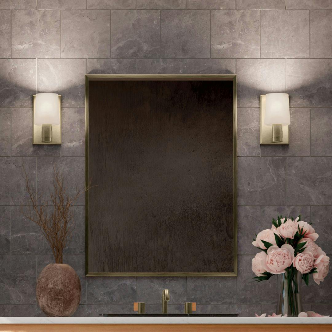Bathroom in daylight with the Adani 8.5 Inch 1 Light Vanity Light with Opal Glass in Champagne Bronze