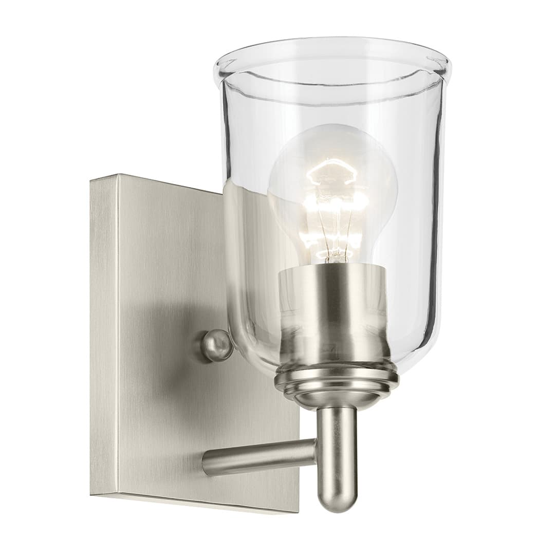 The Shailene 5" 1-Light Wall Sconce with Clear Glass in Brushed Nickel on a white background