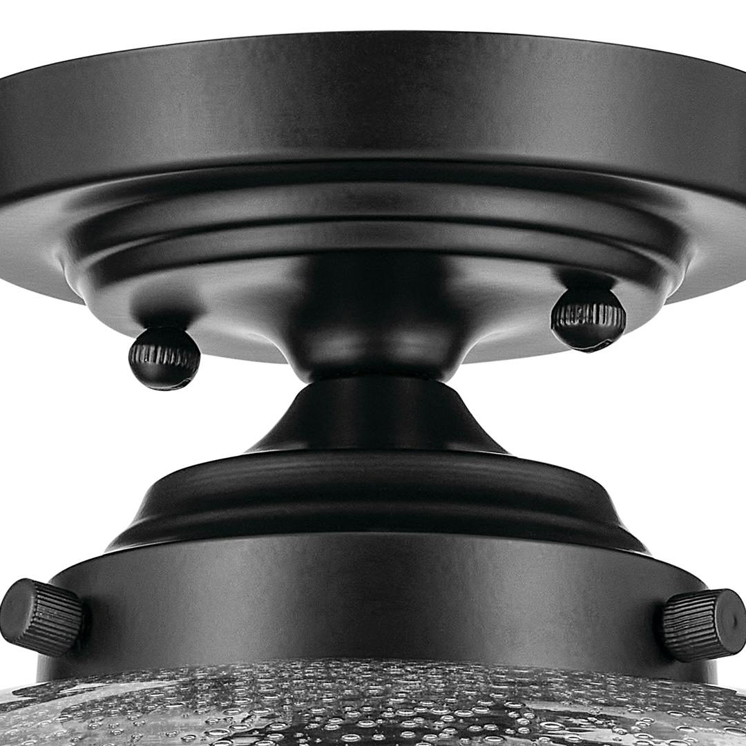 Close up view of the Avery 14.5" 1-Light Flush Mount with Clear Seeded Glass in Black on a white background