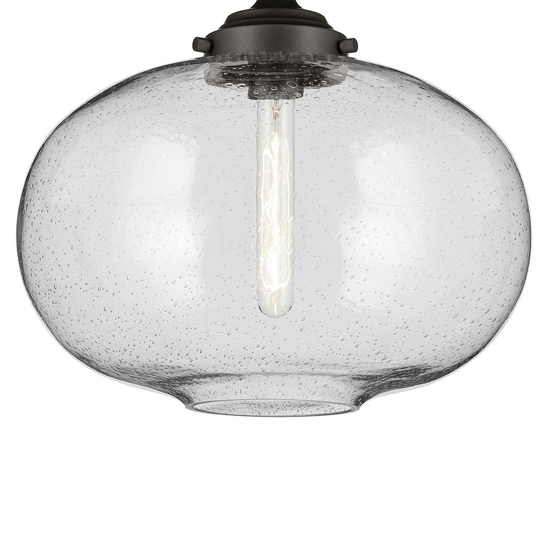 The Avery 14.5" 1-Light Flush Mount with Clear Seeded Glass in Olde Bronze on a white background