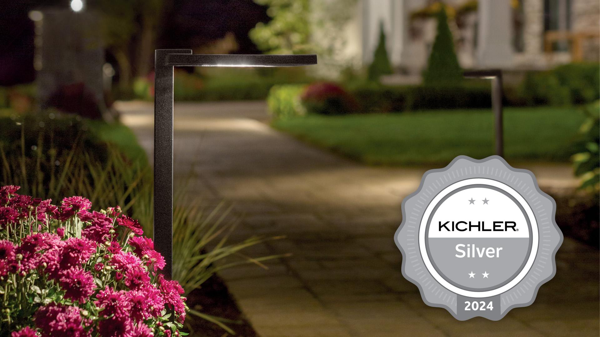 Evening garden pathway featuring a Kichler Silver 2024 medal