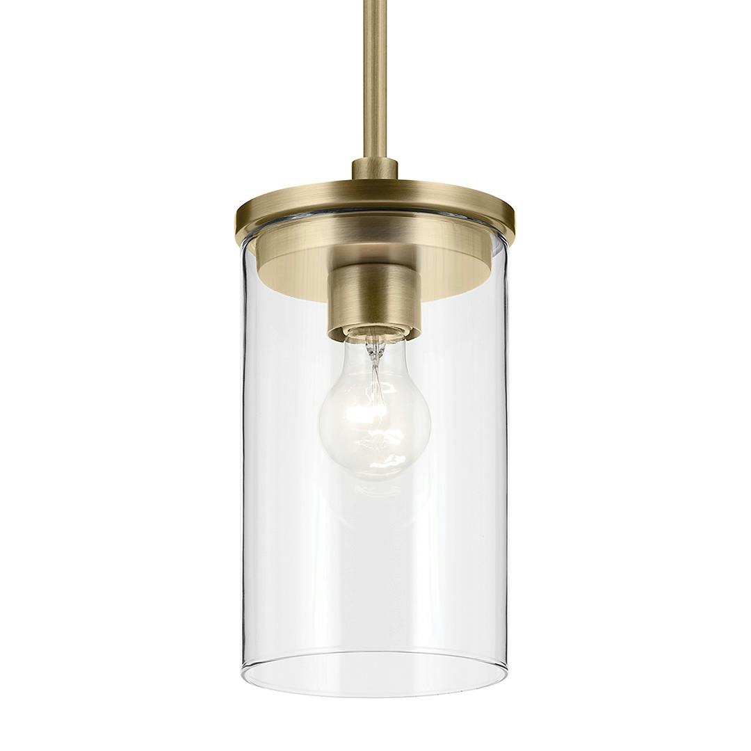 The Crosby 10.75" 1-Light Mini Pendant with Clear Glass in Natural Brass on a white background