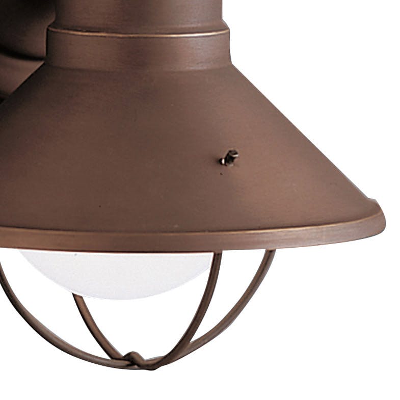 Close up view of the Seaside™7.5" Wall Light Olde Bronze® on a white background