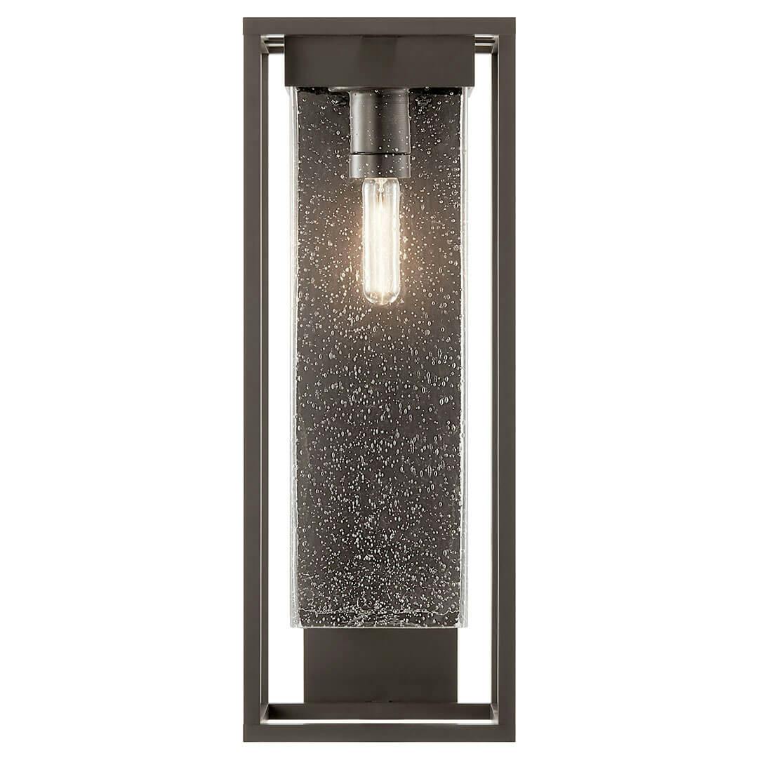 Front view of the The Mercer 24" 1 Light Outdoor Wall Light with Clear Seeded Glass in Olde Bronze on a white background