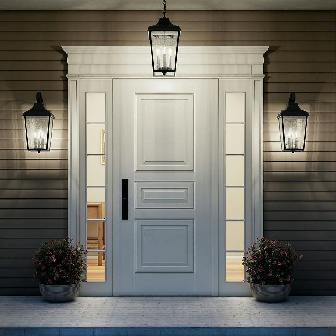 Night time porch with the Forestdale 21.5" 2-Light Outdoor Wall Light in Textured Black