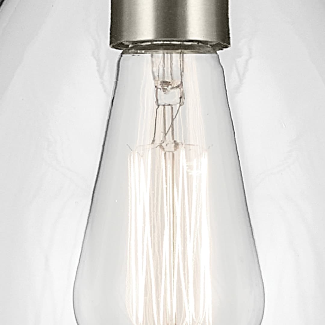 Close up view of the Everly 13.75" 1-Light Bell Pendant with Clear Glass in Brushed Nickel on a white background