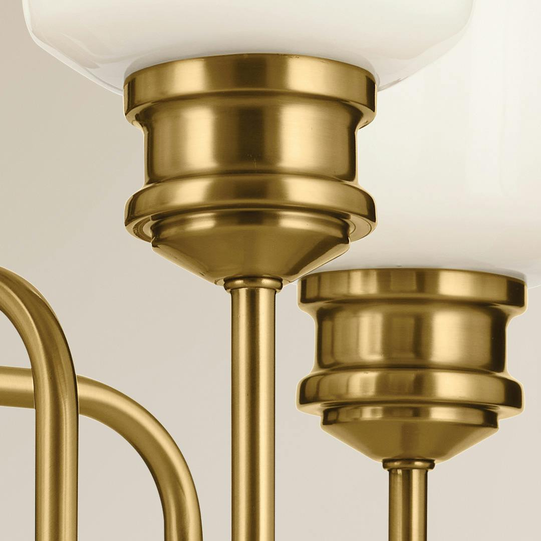Close up view of the Renneker 5 Light Chandelier in Brushed Natural Brass