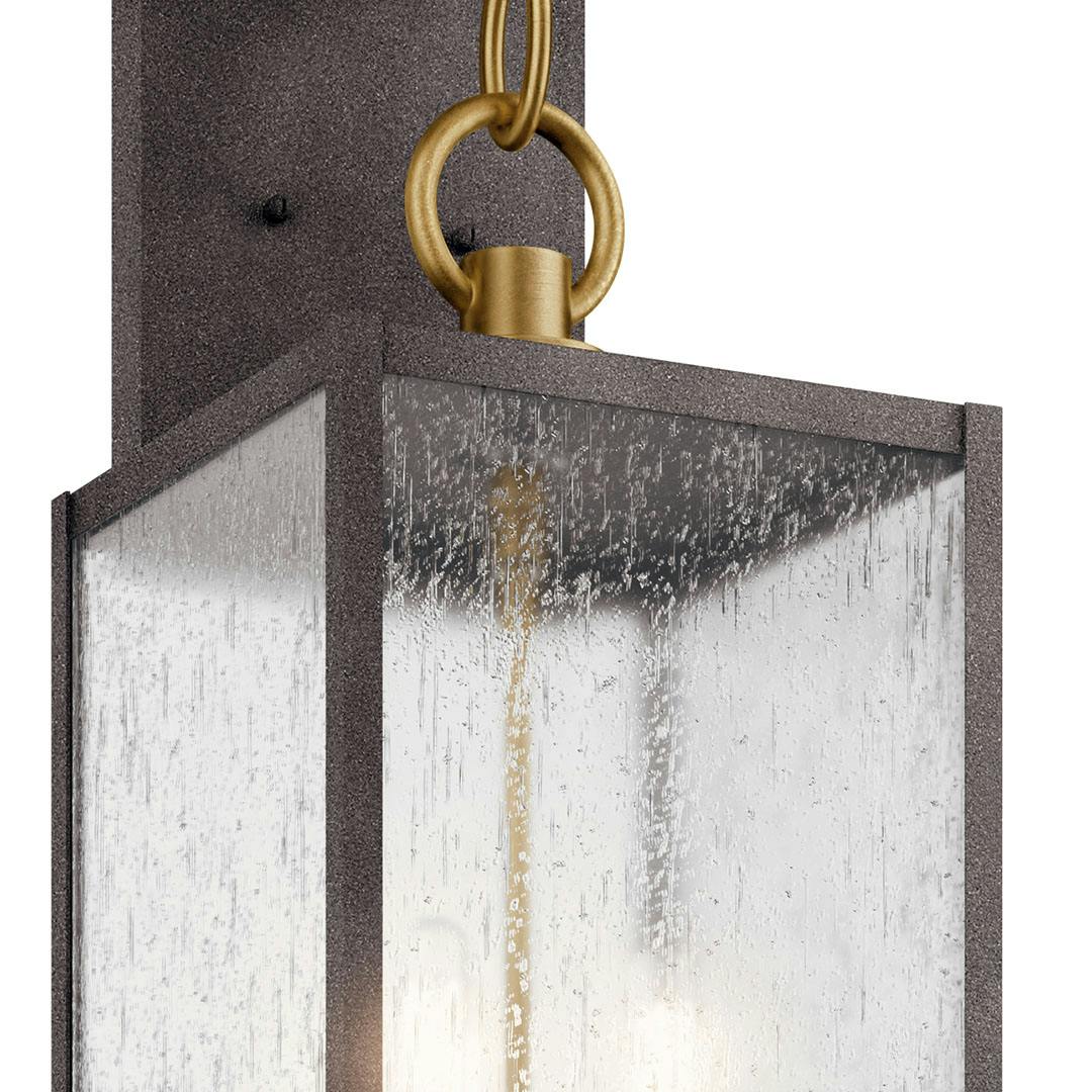 Close up of the Lahden 26" 3 Light Outdoor Wall Light with Clear Seeded Glass in Weathered Zinc on a white background