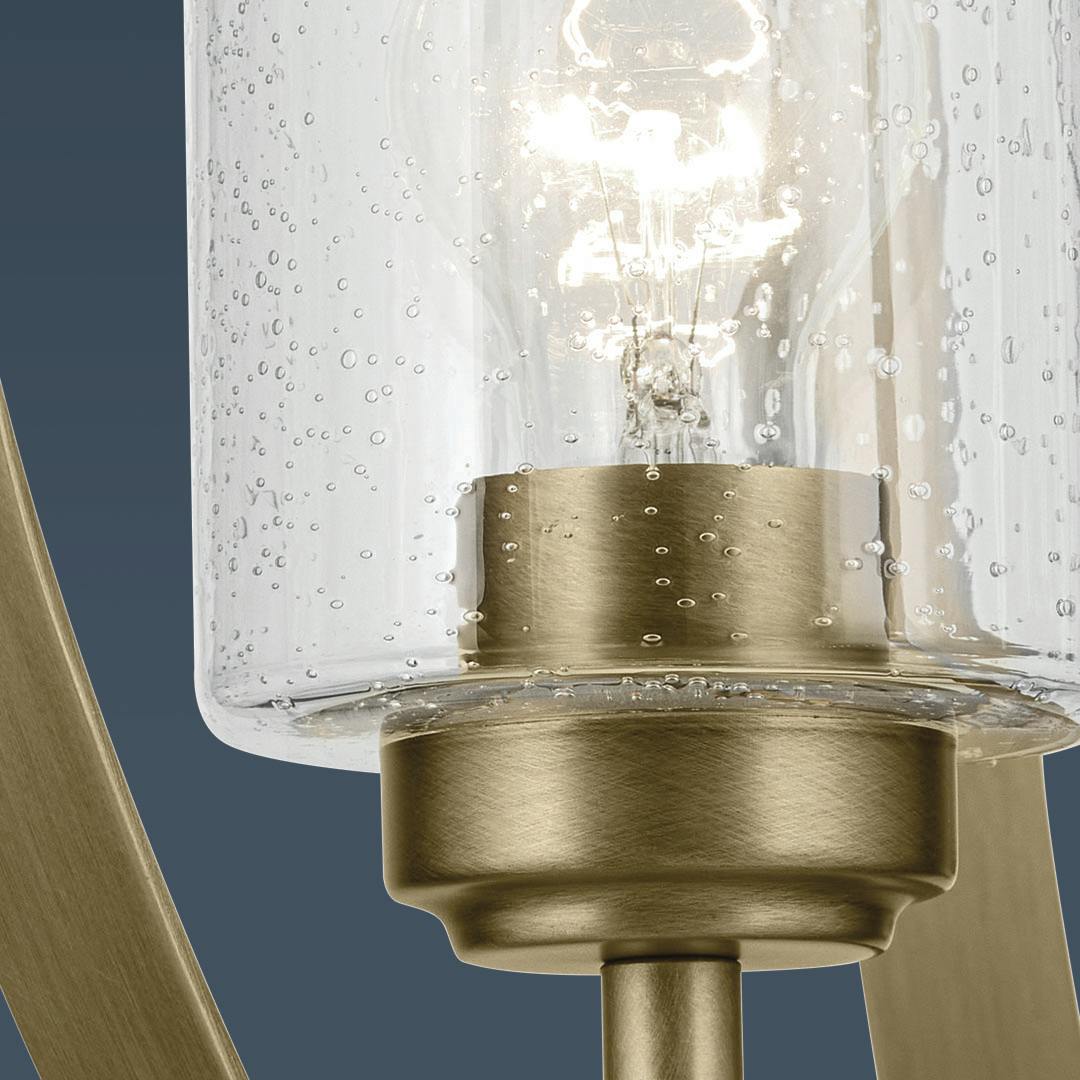 Close up view of the Winslow 30.75" 3-Light Chandelier with Clear Seeded Glass in Natural Brass