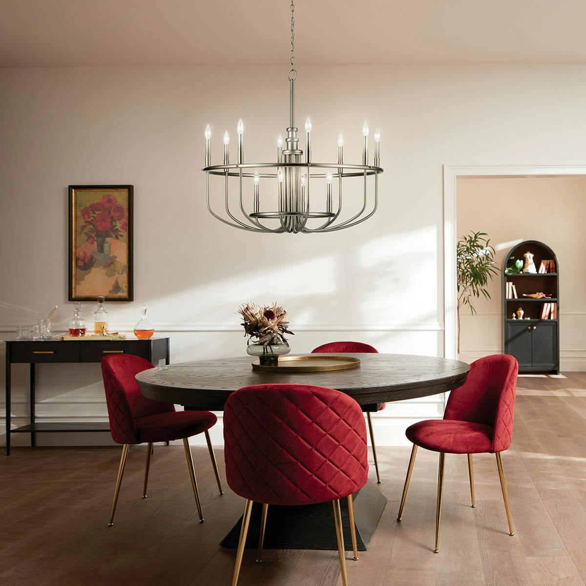 Day time dining room with Capitol Hill 12 Light Chandelier in Brushed Nickel