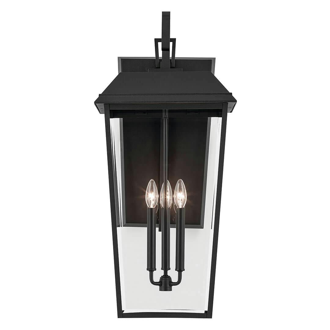 Front view of the Mathus 30.25" 3 Light Outdoor Wall Light with Clear Glass in Textured Black on a white background