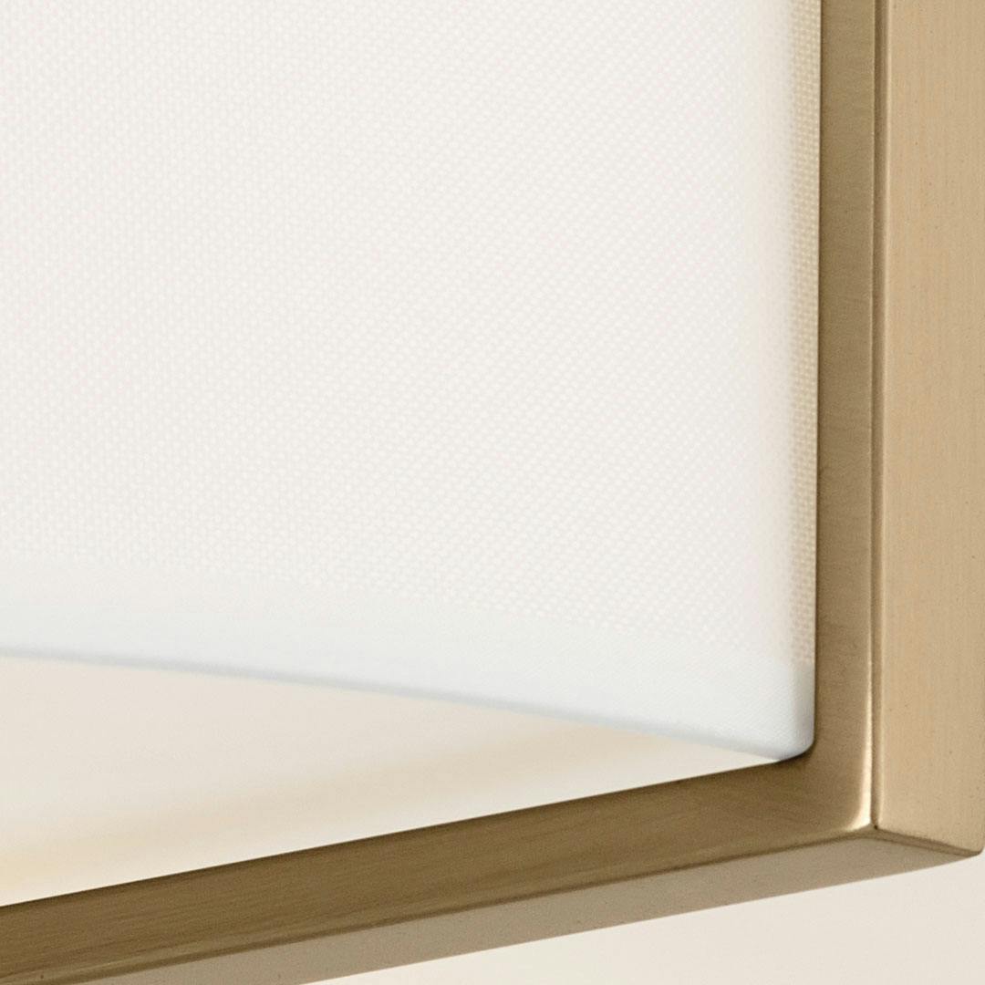 Close up of the Malen 15.5 Inch 2 Light Flush Mount with White Fabric Shade in Champagne Bronze on a white background