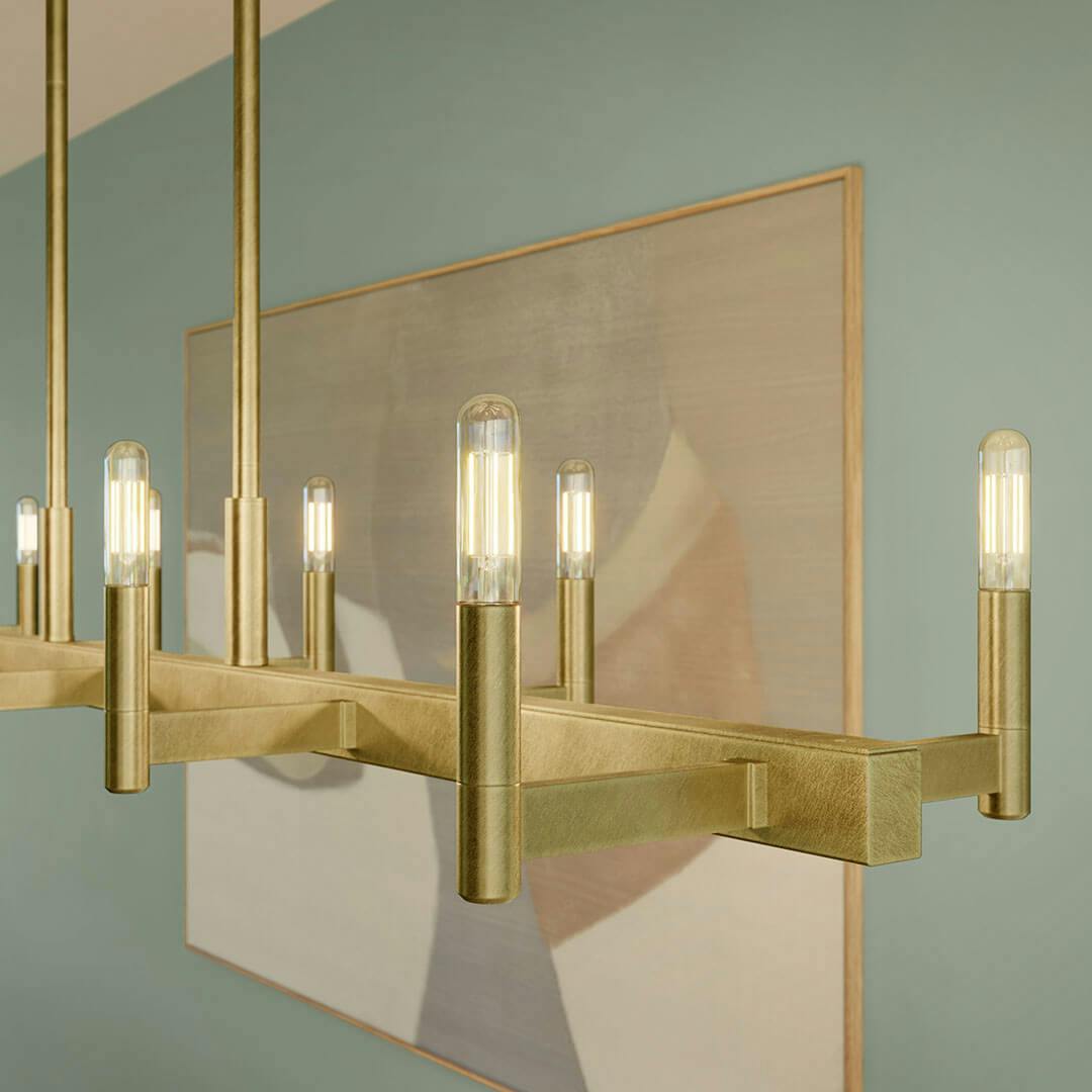 Bar in day light with the Erzo 50" 10 Light Linear Chandelier in Natural Brass