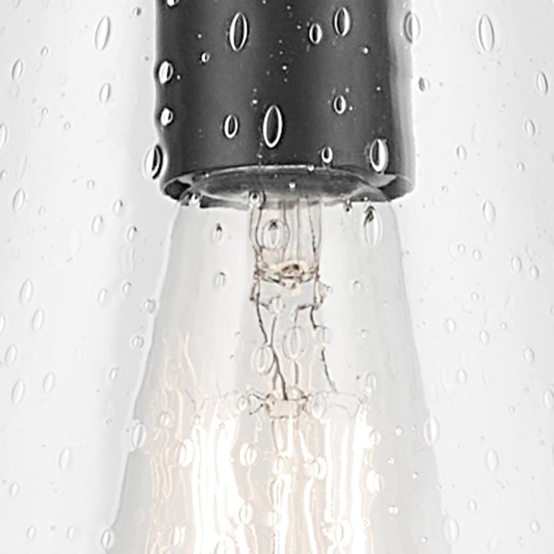 Close up view of the Everly 15.25" 1-Light Cone Pendant with Clear Seeded Glass in Black on a white background