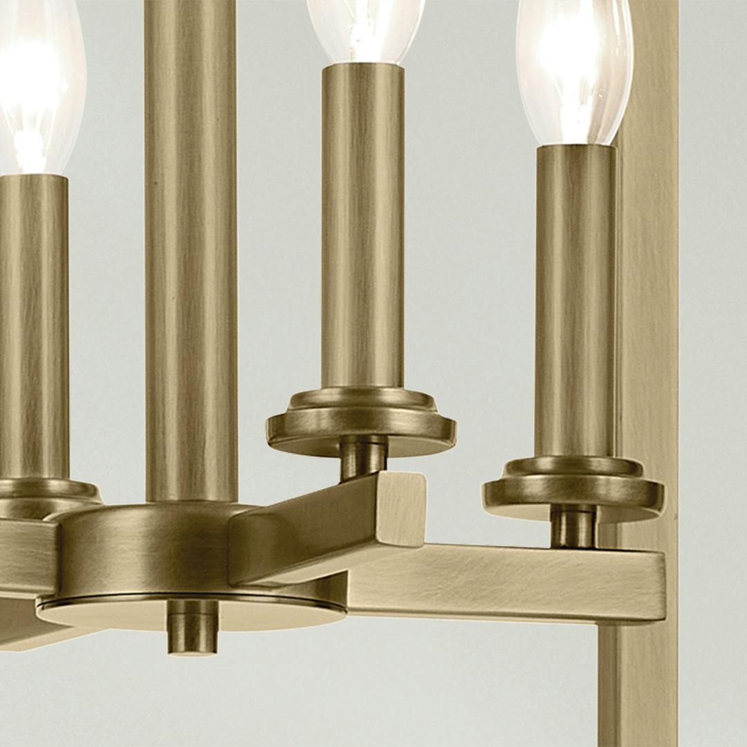 Close up of the Crosby 31" 4-Light Foyer Pendant with Clear Glass in Natural Brass