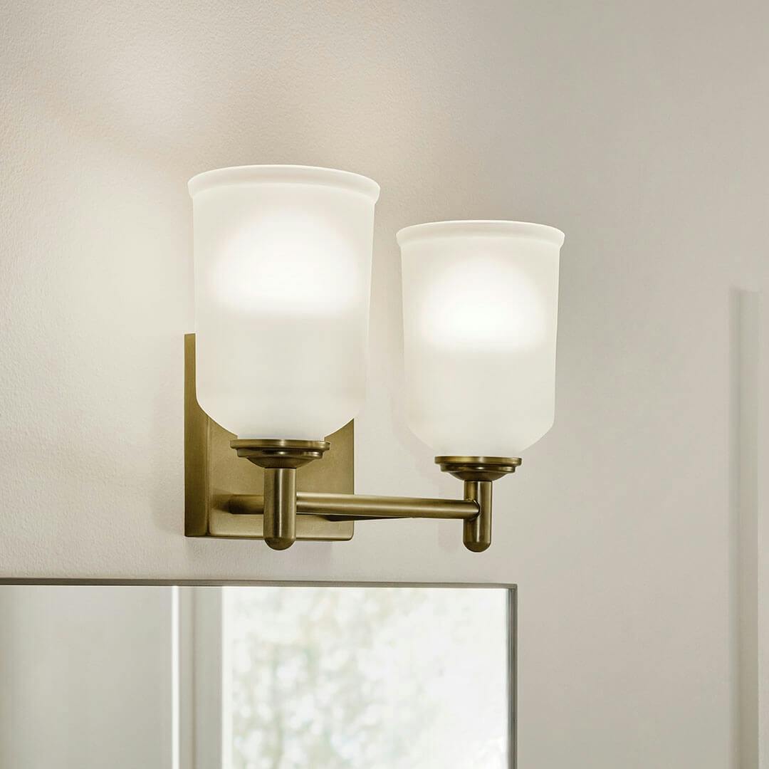 Bathroom in day light with the Shailene 12.5" 2-Light Vanity Light in Natural Brass