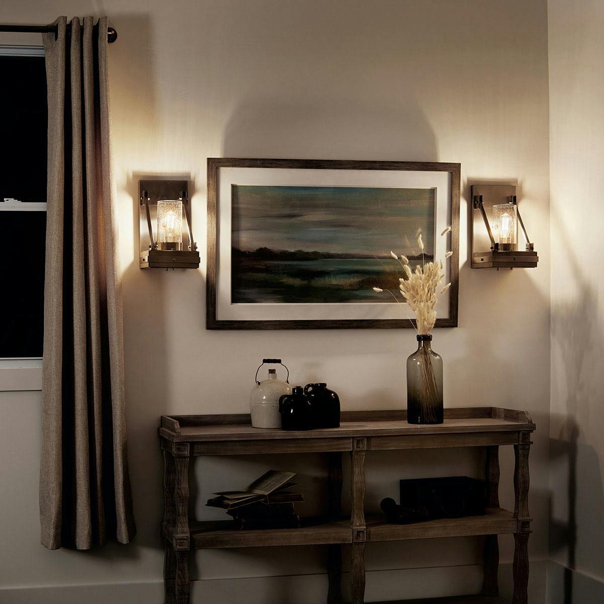 Night time dining room image featuring Colerne wall sconce 43436CLP