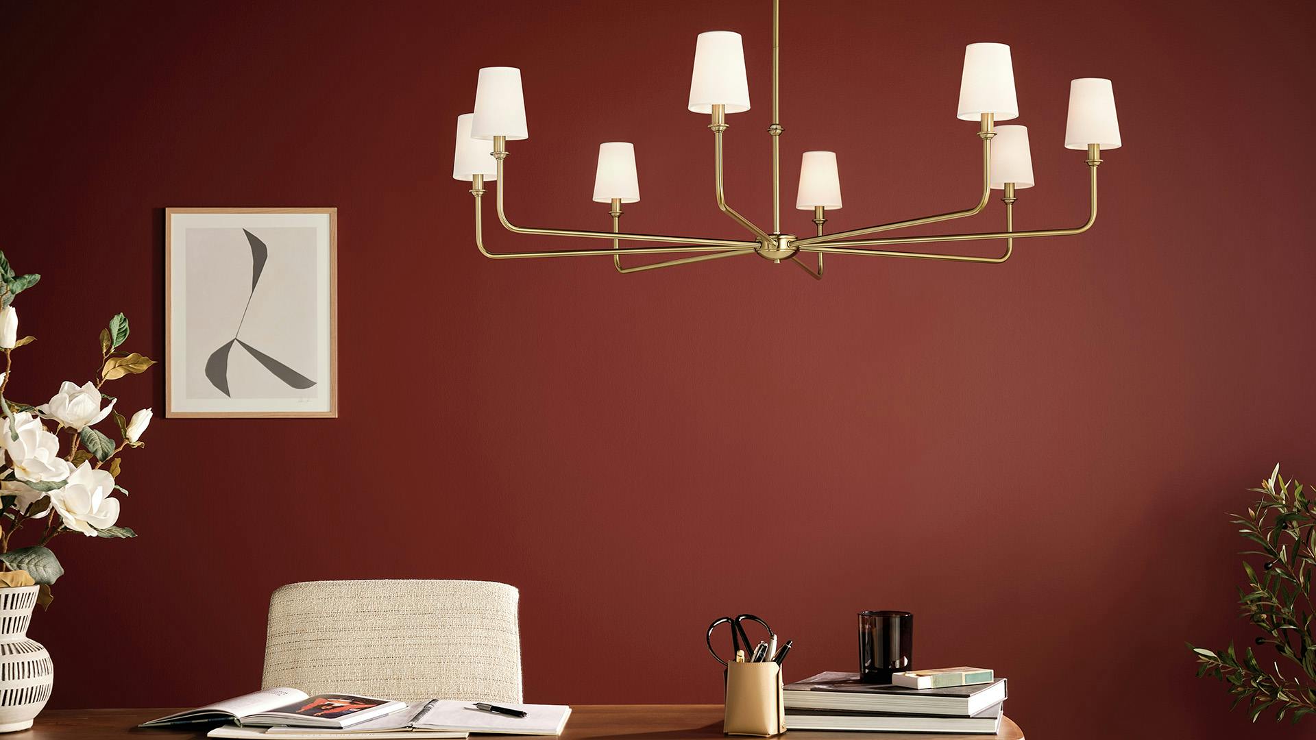 Office with Pallas chandelier over the desk with Burgundy wall