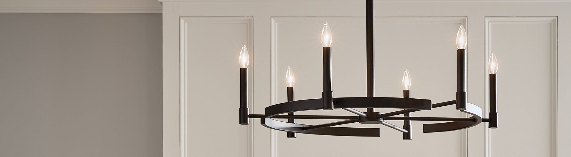 Close-up of Tolani Black chandelier in a dining room