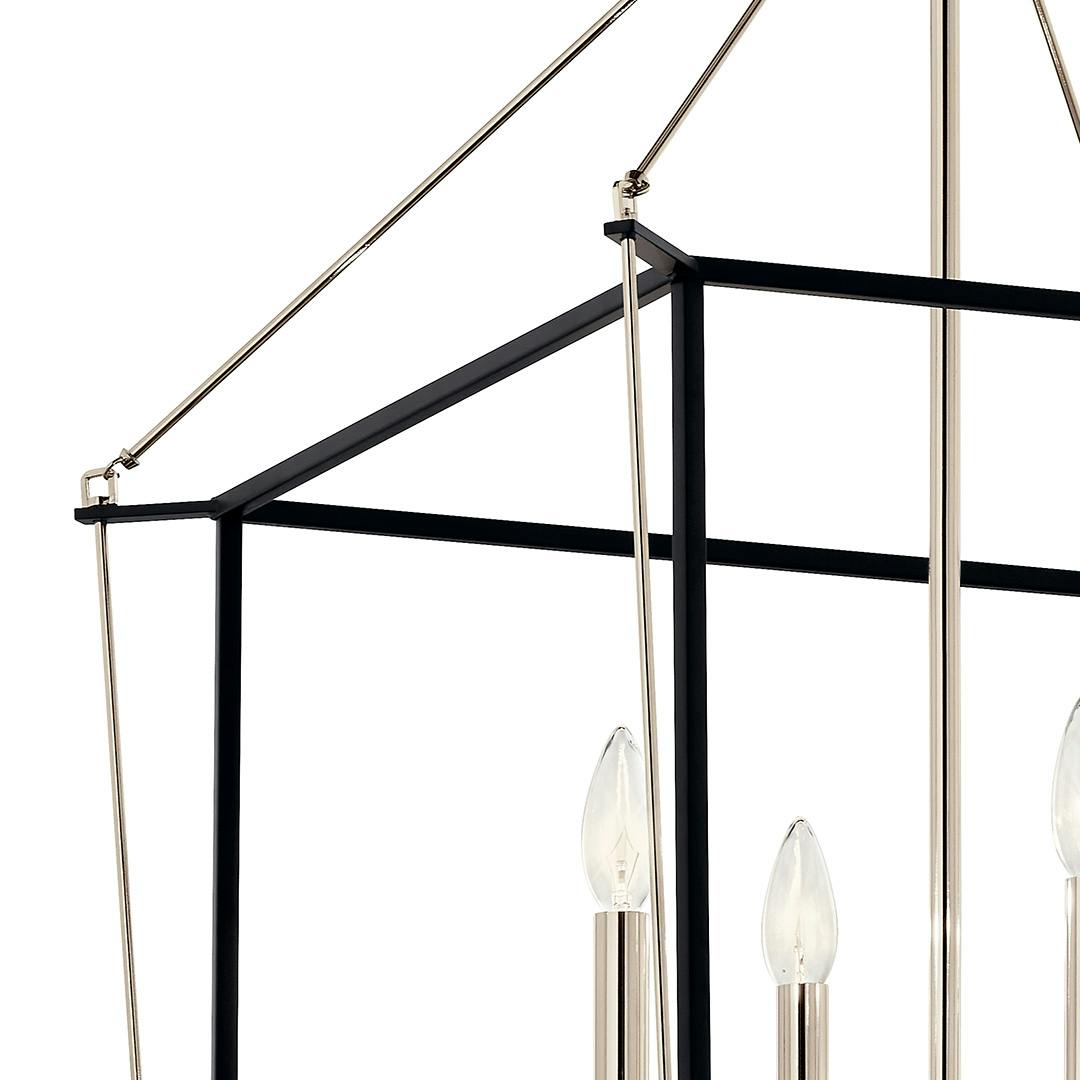 Close up of the Eisley 30 Inch 4 Light Foyer Pendant in Polished Nickel and Black on a white background