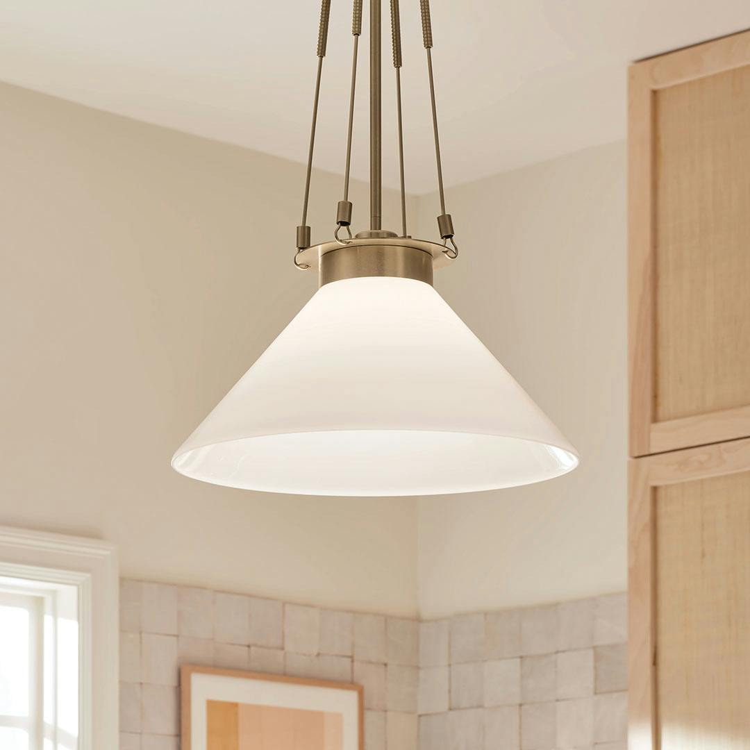 Day time kitchen with the Albers 18.25 Inch 1 Light Pendant with Opal Glass in Champagne Bronze