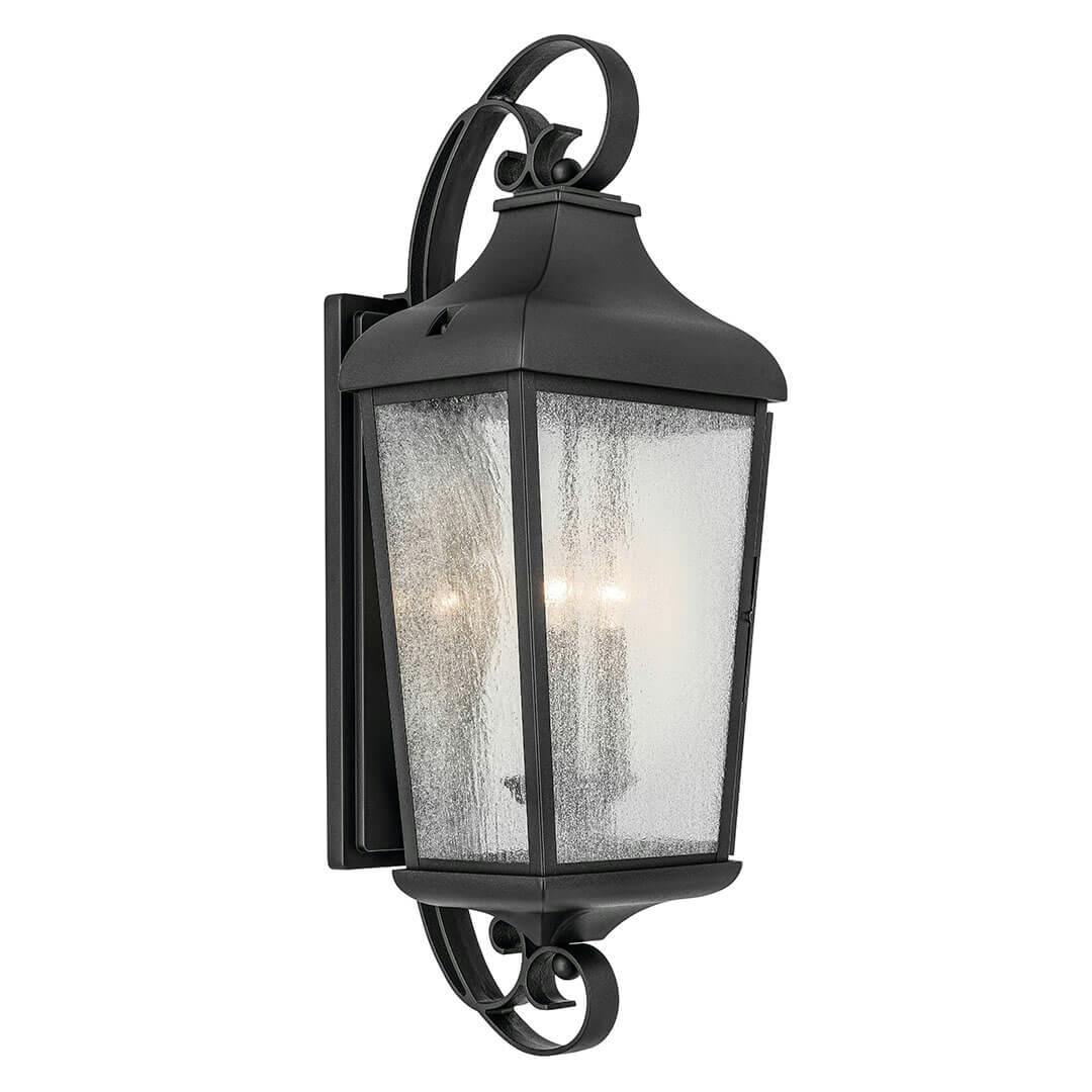 The Forestdale 30.75" 3-Light Outdoor Wall Light with Clear Water Glass in Textured Black on a white background
