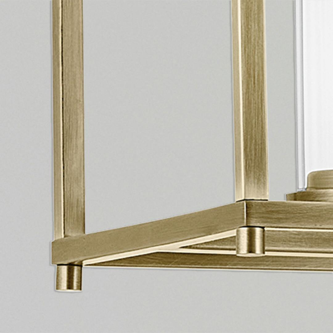 Close up of the Crosby 41.5" 5-Light Linear Chandelier with Clear Glass in Natural Brass