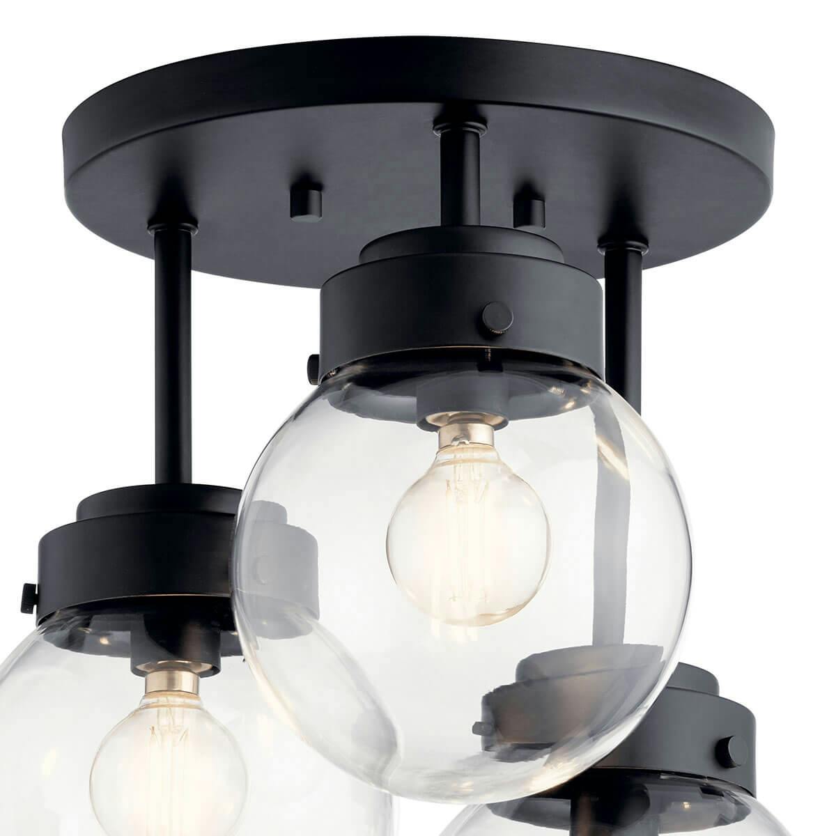 Close up view of the Strabo 12" 3 Light Semi Flush Black on a white background