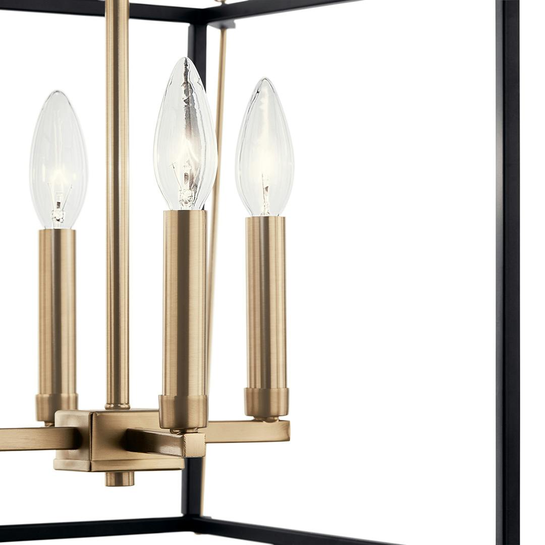 Close up of the Eisley 21.25 Inch 4 Light Foyer Pendant in Champagne Bronze and Black on a white background
