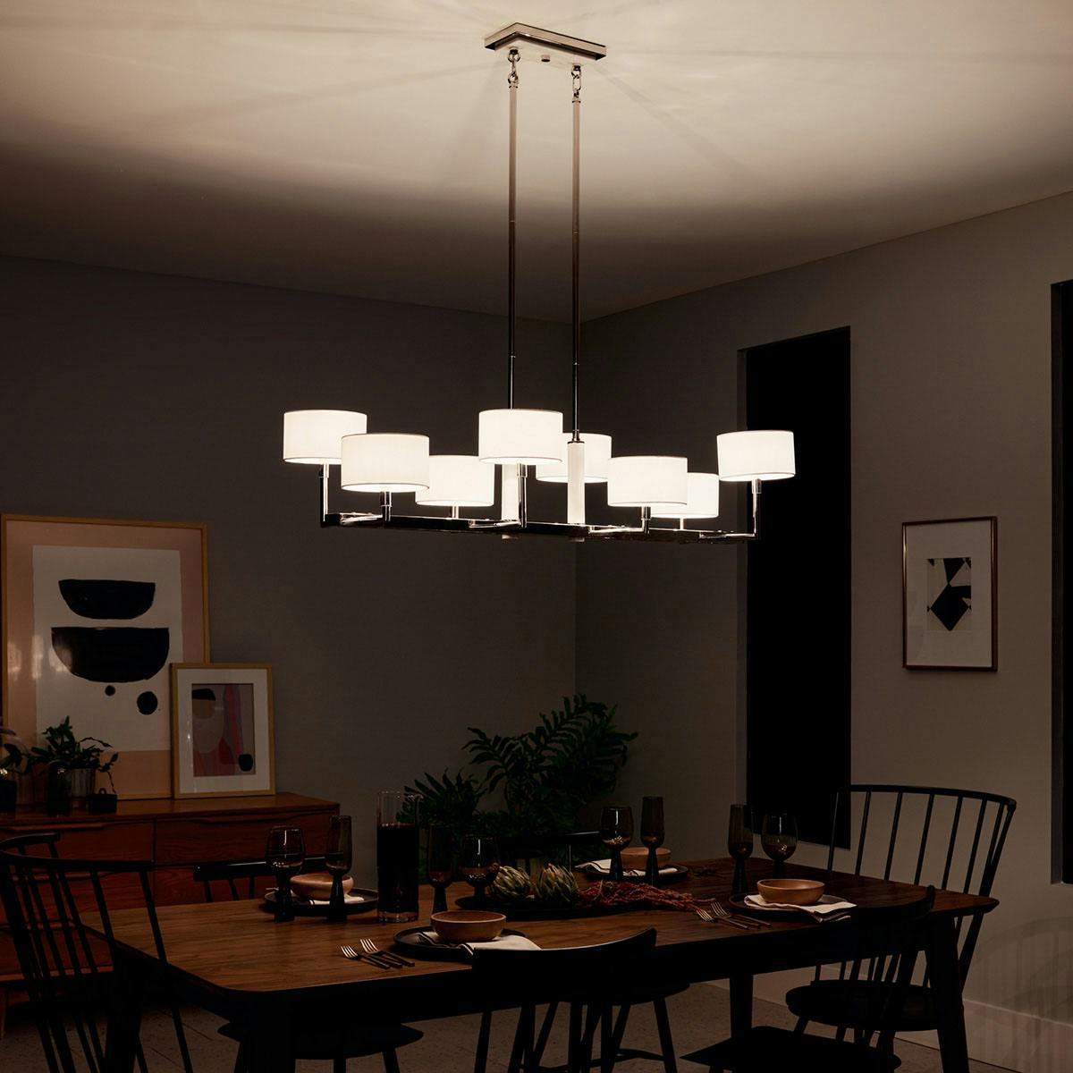 Night time dining room image featuring Laurent chandelier 52054PN