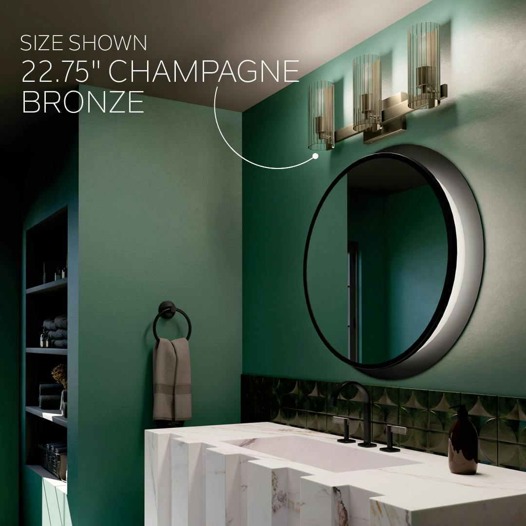 3 Light Jemsa Vanity Light in Champagne Bronze Shown Over a Bathroom Sink