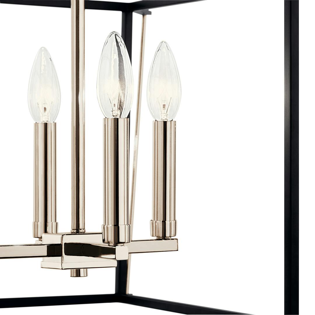 Close up of the Eisley 21.25 Inch 4 Light Foyer Pendant in Polished Nickel and Black on a white background