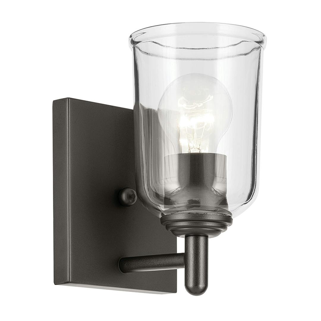 The Shailene 5" 1-Light Wall Sconce with Clear Glass in Olde Bronze on a white background