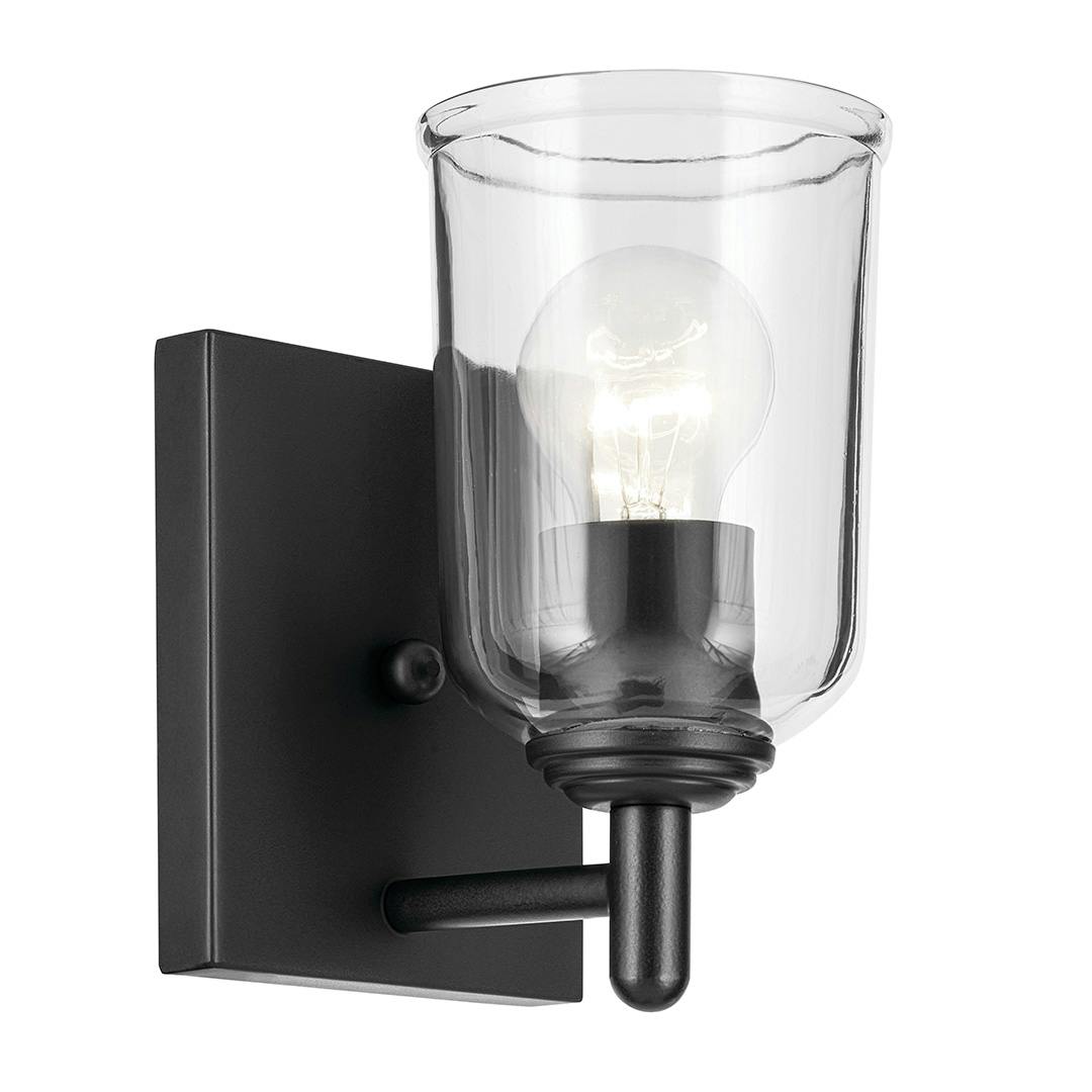 The Shailene 5" 1-Light Wall Sconce with Clear Glass in Black on a white background
