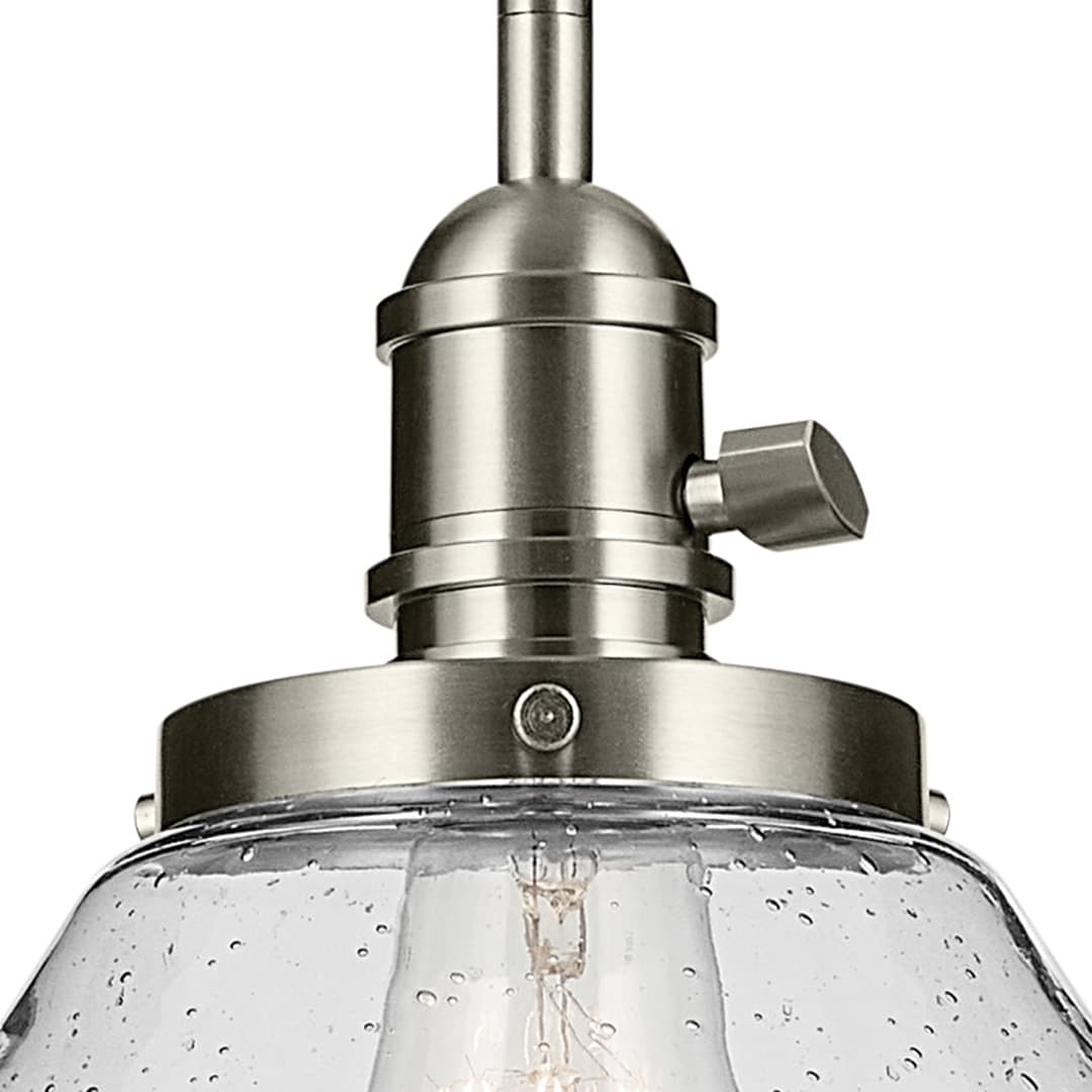 Close up view of the Avery 11.75" 1-Light Cone Pendant with Clear Seeded Glass in Nickel on a white background