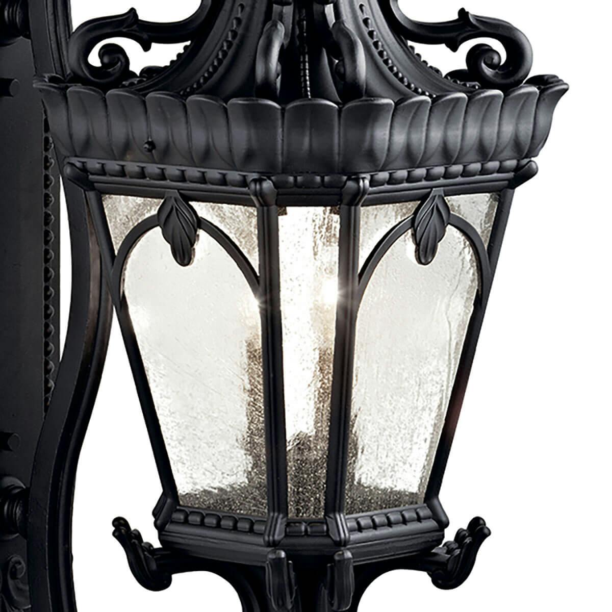 Close up view of the Tournai 37.75" 4 Light Wall Light Black on a white background