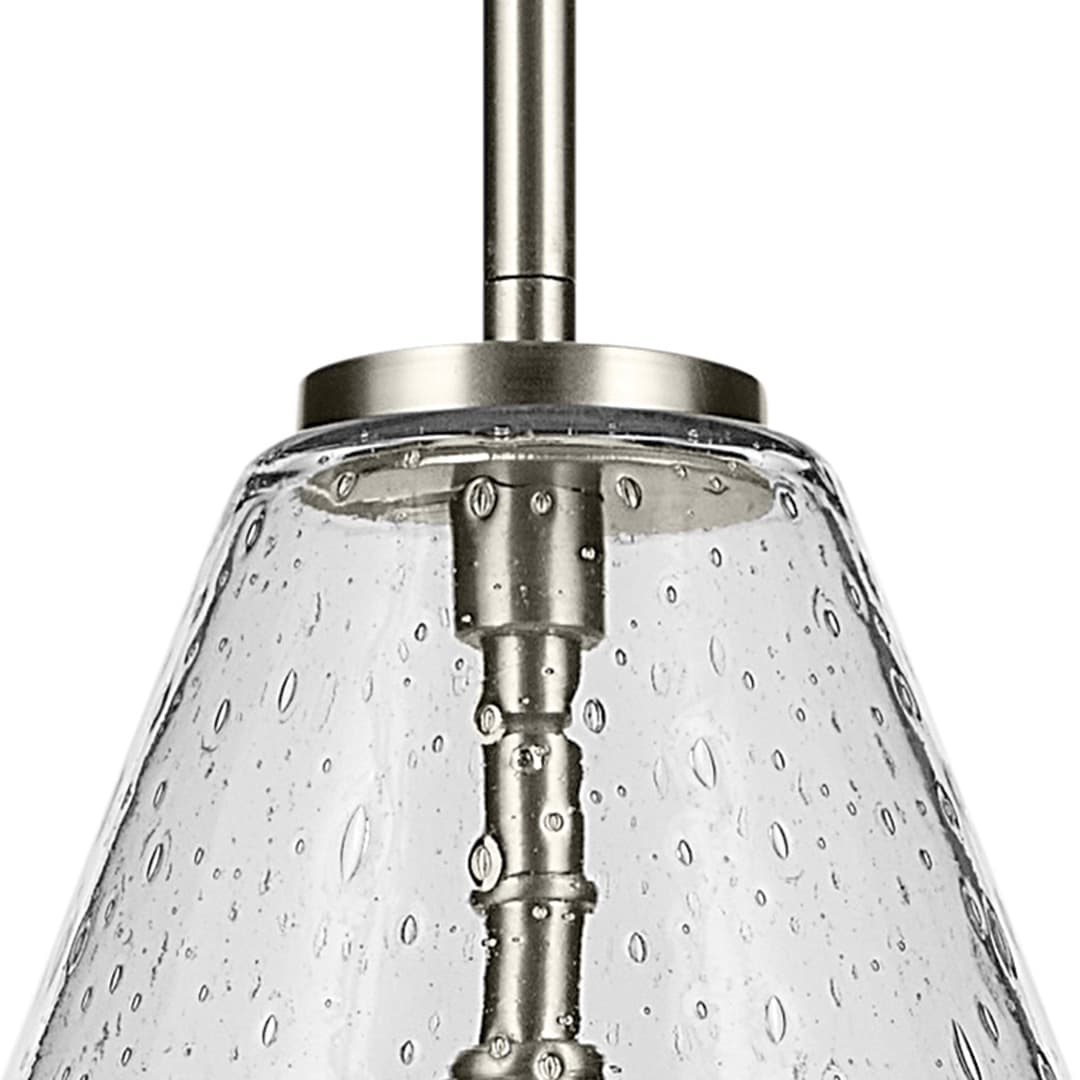 Close up view of the Everly 15.5" 1-Light Cone Pendant with Clear Seeded Glass in Brushed Nickel on a white background