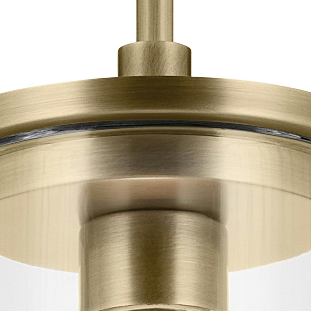 Close up view of the Crosby 10.75" 1-Light Mini Pendant with Clear Glass in Natural Brass on a white background