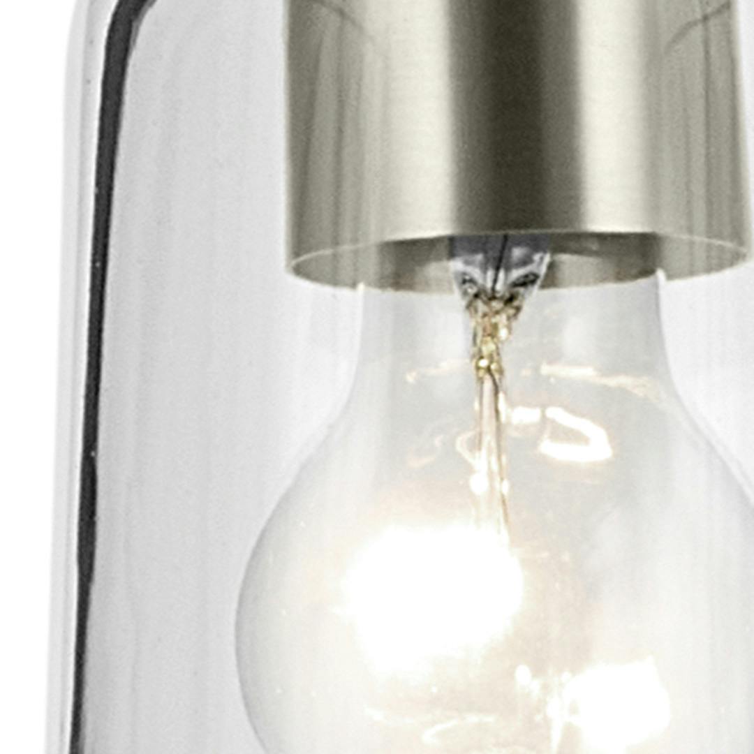 Close up view of the Shailene 11.25" 1-Light Mini Bell Pendant with Clear Glass in Brushed Nickel on a white background