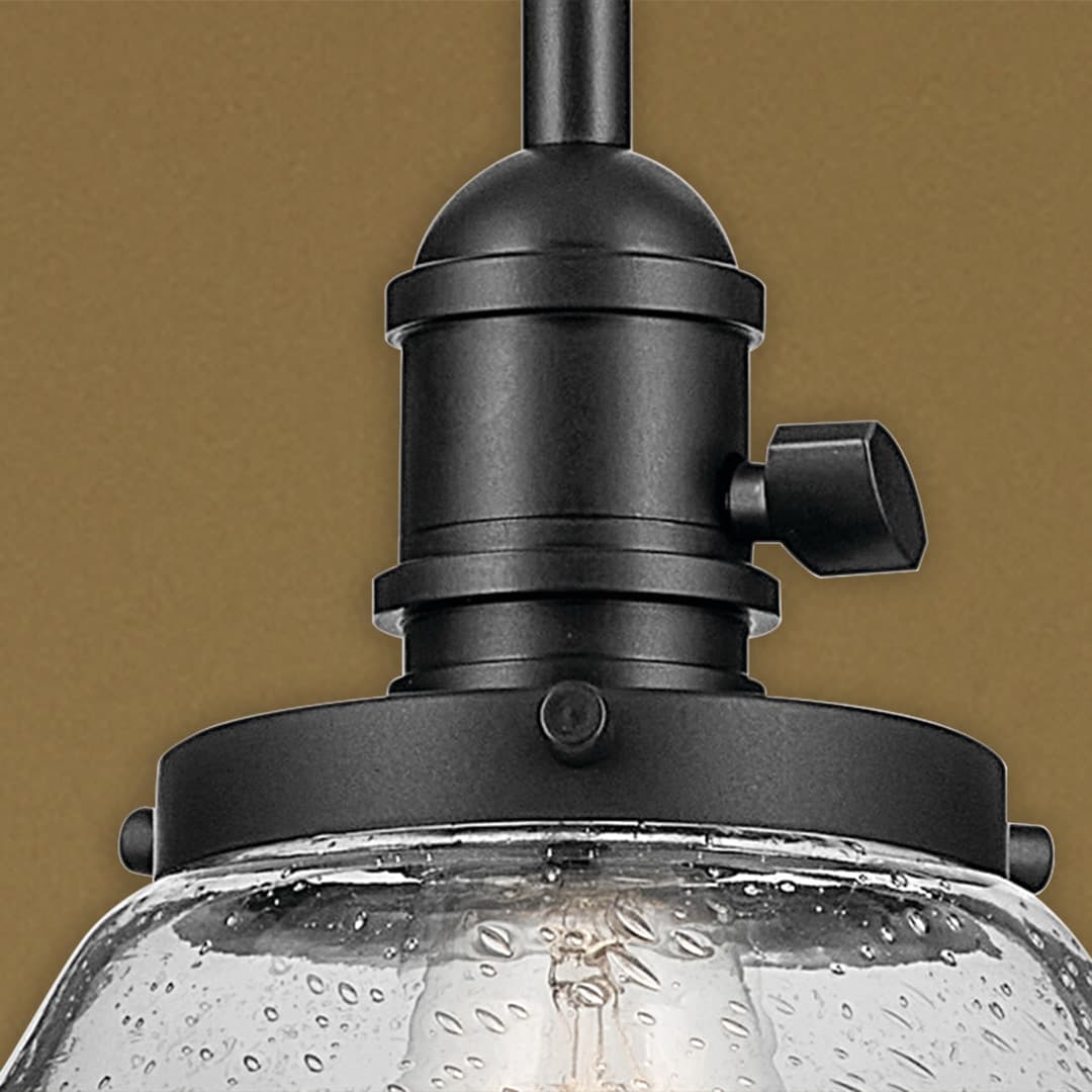 Close up of the Avery 11.25" 1-Light Bell Pendant with Clear Seeded Glass in Black