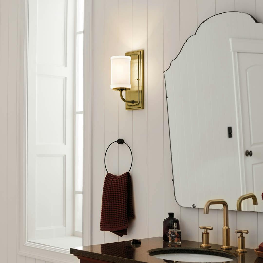 Day time bathroom featuring Vetivene vanity light 52454NBR