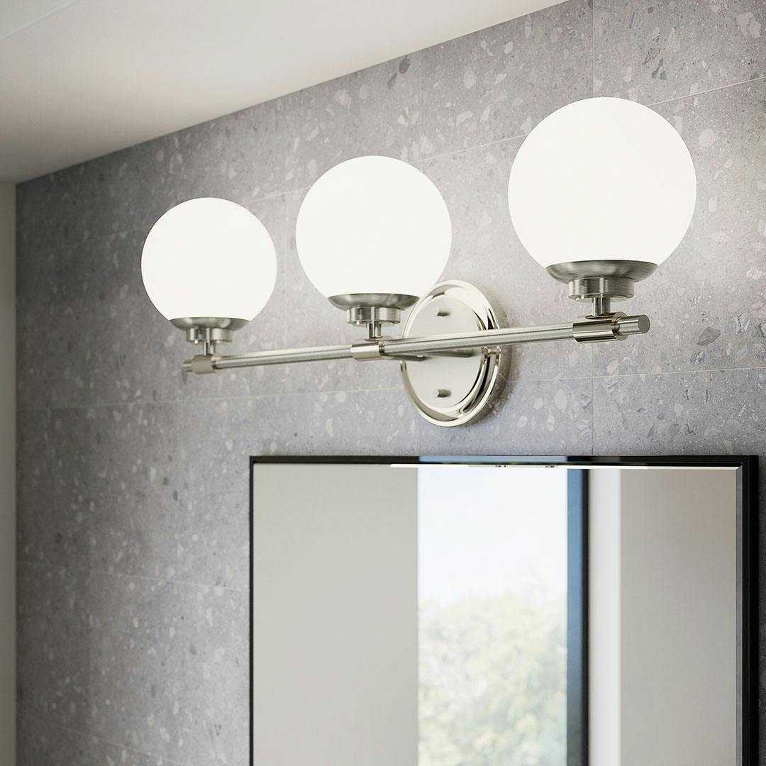 Day time bathroom with the Benno 24.5 Inch 3 Light Vanity Light with Opal Glass in Polished Nickel and Brushed Nickel